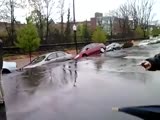 Landslide swallows multiple cars off the road