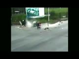 Scooter rider calmly drives off after a miraculous escape from death.