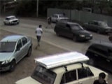 Couple Holding Hands Run In Front Of A Car