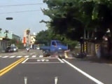 Van Takes Down A Biker At An Intersection