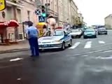 Crazy naked man on the roof of police car