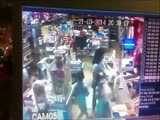 Shop owner's life flashes before his eyes as he is shot at during an attempt robbery.