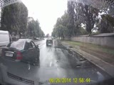 Driver Splashes Another Car And Ends Up Riding On It's Hood