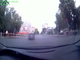 Scooter rider breaks his neck crashing into a car at an inersection.