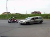 Couple On Bike Are Sent Tumbling After Hitting Car