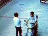 Man chatting with his friend is fatally hit by a falling glass sheet on his head.