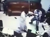 Masked men with sticks beats the shit out of an office worker