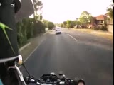 guy with bike gets sandwiched betveen cars