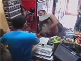 Thief Takes A Quick Beating After Being Caught Shopliting