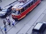 Woman Crossing The Tram Tracks Too Slow