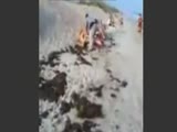 Drunk Beach Girl Escapes From Fat Cop And Swims To Freedom