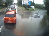 Cyclist...Pothole...Puddle