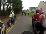 Girl Falls Off Motorcycle and Gets Stuck On Tire