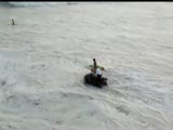 Police Officer Loses His ATV In The Ocean?!