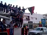 Libyan Rebel Sniped While Celebrating Victory On Top Of A Truck