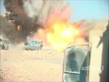 Huge IED Detonates As Iraqi Army Vehicles Advance On A Highway.