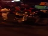 Angry crowd against drunk driver who hitted some men