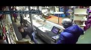 Shop clerk with a chair vs armed robber