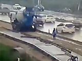 Cement Truck Reverses Over A Pedestrian