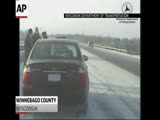 Out of Control SUV Hits Police Car in Snow