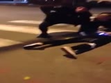 Police Punch a Man on Ground and Billy Club Another Who Tries to Stop them