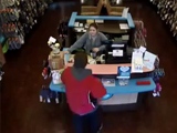 Thug Sucker Punches Female Clerk In Store