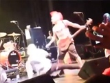 Punk Rocker Violently Beats And Kicks A Fan In The Face On Stage