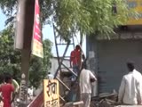 Indian Guy Shoots At Looters!