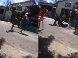 Guy Pulls A Topless Woman Through The Street By The Hair And Kicks Her In The Head