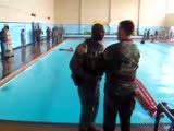 guy humiliates himself in army by showing that he swims like a stone