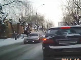 Pedestrian Tries To Outrun A Car And Fails Miserably