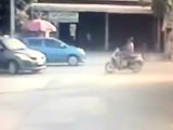 Scooter Rider Hits A Car Goes Airborne