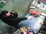 Store Owner Disarms Robber Who's Pointing A Gun At His Face