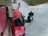 Two Bikers Ride Straight Into An Oncoming Truck