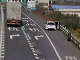 Truck Wheel Comes Off And Sends Motorist Tumbling Over The Crash Barrier