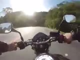 Speeding biker hits a guy and falls