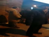 Wife beats husband in public