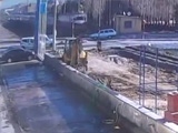 Car Gets Smashed By A Train At A Crossing