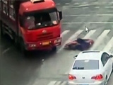 Chinese Scooter Rider Killed Under The Wheels Of A Truck