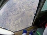 Skydiving guy almost hits plane in freefall