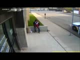 Canadian cop kicks homeless man