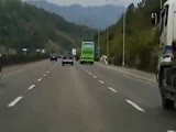 Truck hits the car in very slow mo