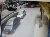 Speeding biker falls into the gutter