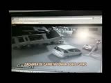 Truck overtuns and damages the car