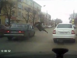 Oblivious Man Walks Straight Into A Speeding Car