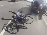 This Is Why You Don't Ride A Bicycle In The Middle Of A Busy Highway