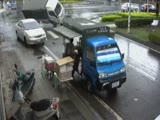 Car T Bones A Truck Sending It Crashing Into A Food Stall