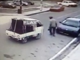 Guy Gets Sandwiched Between A Mini Truck And A Car