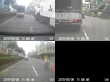 Old cyclist falls under the truck