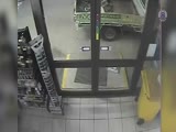 idiot robber tries to steal ATM